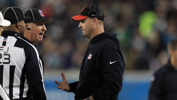 Cincinnati Bengals head coach Zac Taylor talks with the referees during the third quarter of a regular season NFL football matchup Monday, Dec. 4, 2023 at EverBank Stadium in Jacksonville, Fla. The Cincinnati Bengals defeated the Jacksonville Jaguars 34-31 in overtime. [Corey Perrine/Florida Times-Union]